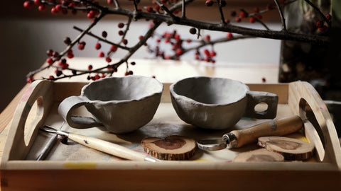 “Come along inside... We’ll see if tea and buns can make the world a better place.”